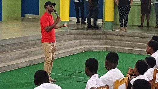 A police officer interacts with students of West St. George Secondary School in February. 