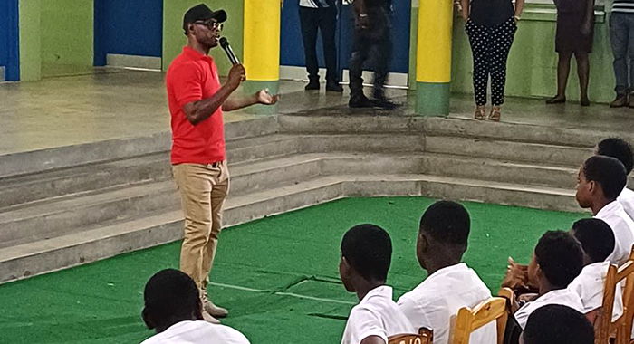 A police officer interacts with students of West St. George Secondary School in February. 