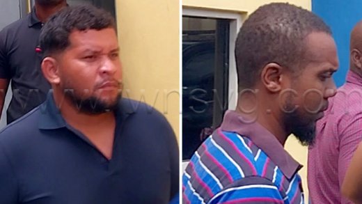 Venezuelan Frank Garcia and Grenadian Alister Haynes outside the Serious Offences Court on Thursday,  April 24, 2026.