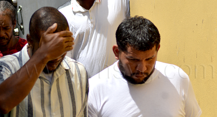 Alister Haynes, left, and Frank Garcia outside the Serious Offences Court in Kingstown on Thursday, May 14, 2026.