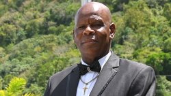 Kendel Neverson poses with his taxi at Sandals Saint Vincent and the Grenadines. 