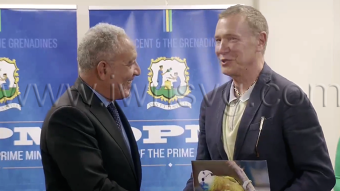 Prime Minister of St. Vincent and the Grenadines Godwin Friday, left, Chairman of Global Ports Holding, Mehmet Kutman.