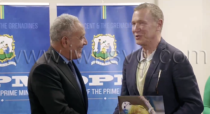 Prime Minister of St. Vincent and the Grenadines Godwin Friday, left, Chairman of Global Ports Holding, Mehmet Kutman.