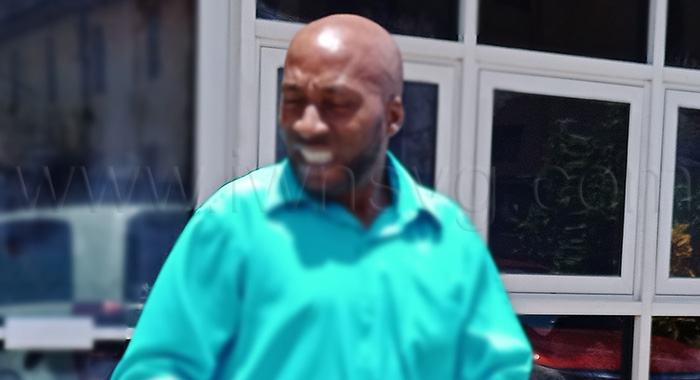 Woman beater Roen Richardson leaves the Kingstown Magistrate's Court on June 2, 2026.