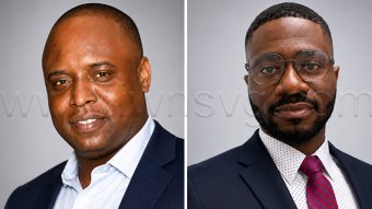 Raffique Samuel, left, director of operations and business development, and Esteban Richard-Hernández, manager of expedited services and customer solutions at the SVG Postal Corporation. 