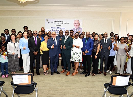 Prime Minister Godwin Friday and his wife, Ave Friday, pose with Vincentians in Taiwan and their guests during a luncheon in Taipei, Taiwan on Saturday, Aug. 15, 2026.