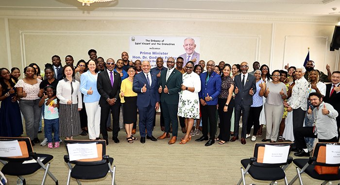 Prime Minister Godwin Friday and his wife, Ave Friday, pose with Vincentians in Taiwan and their guests during a luncheon in Taipei, Taiwan on Saturday, Aug. 15, 2026.