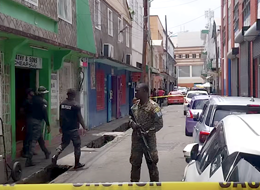Police at the scene of the shooting incident in Middle Street, Kingstown, on Saturday, Aug. 15, 2026. (Photo: AShford Peters/CIBS)