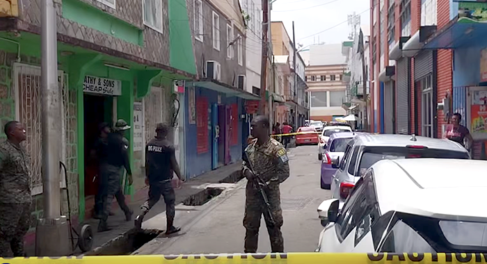 Police at the scene of the shooting incident in Middle Street, Kingstown, on Saturday, Aug. 15, 2026. (Photo: AShford Peters/CIBS)