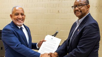 Prime Minister of St. Vincent and the Grenadines, Godwin Friday, left, and Stephen “Scombo” John, ambassador-at-large for diaspora affairs.
