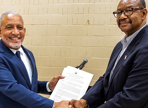 Prime Minister of St. Vincent and the Grenadines, Godwin Friday, left, and Stephen “Scombo” John, ambassador-at-large for diaspora affairs.