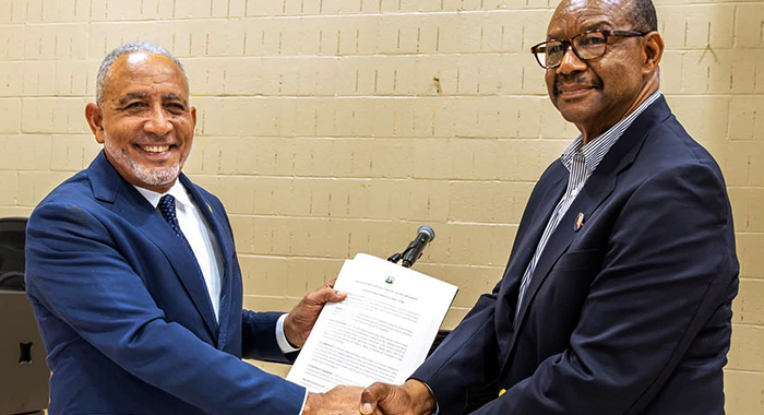 Prime Minister of St. Vincent and the Grenadines, Godwin Friday, left, and Stephen “Scombo” John, ambassador-at-large for diaspora affairs.