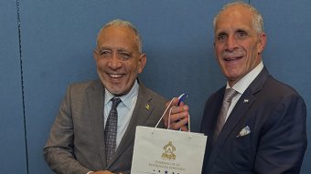 SVG's Prime Minister Godwin Friday, left, and Honduras' President Nasry Juan Asfura Zablah.