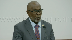 Deputy Prime Minister and National Security Minister St. Clair Leacock speaking in Parliament on Aug. 27, 2026.