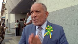 Prime Minister Godwin Friday, a respondent in the election petitions case, speaks to the media outside the High Court in Kingstown on Thursday, Oct. 1, 2026. 