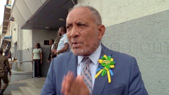 Prime Minister Godwin Friday, a respondent in the election petitions case, speaks to the media outside the High Court in Kingstown on Thursday, Oct. 1, 2026. 