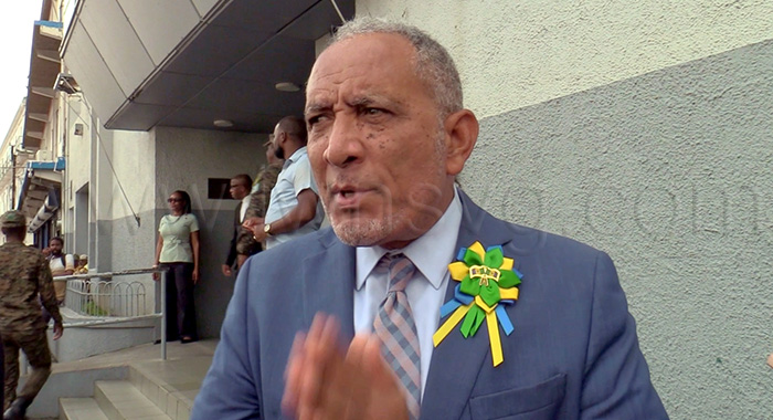 Prime Minister Godwin Friday, a respondent in the election petitions case, speaks to the media outside the High Court in Kingstown on Thursday, Oct. 1, 2026. 