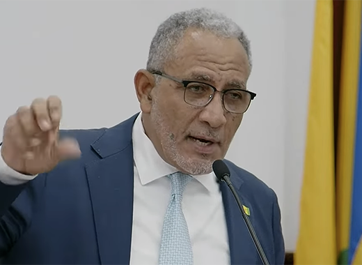 Prime Minister and Minister of Finance Godwin Friday speaking in Parliament on Thursday, Oct. 22, 2026. 
