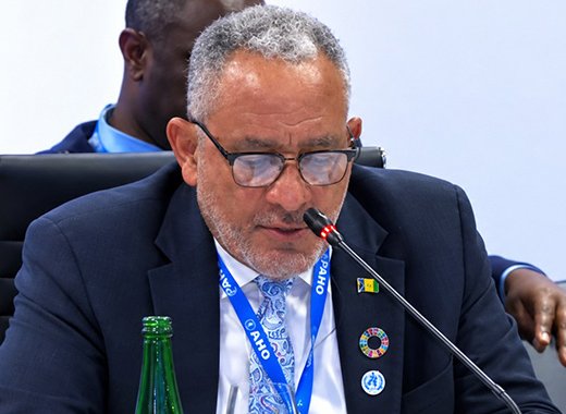 Prime Minister Godwin Friday speaking at the World Bank annual meetings in Thailand. 