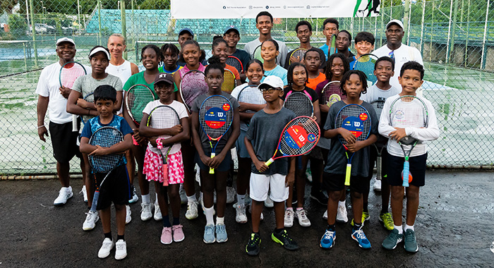 A group photo of junior players and coaches on the final day of the clinic.
